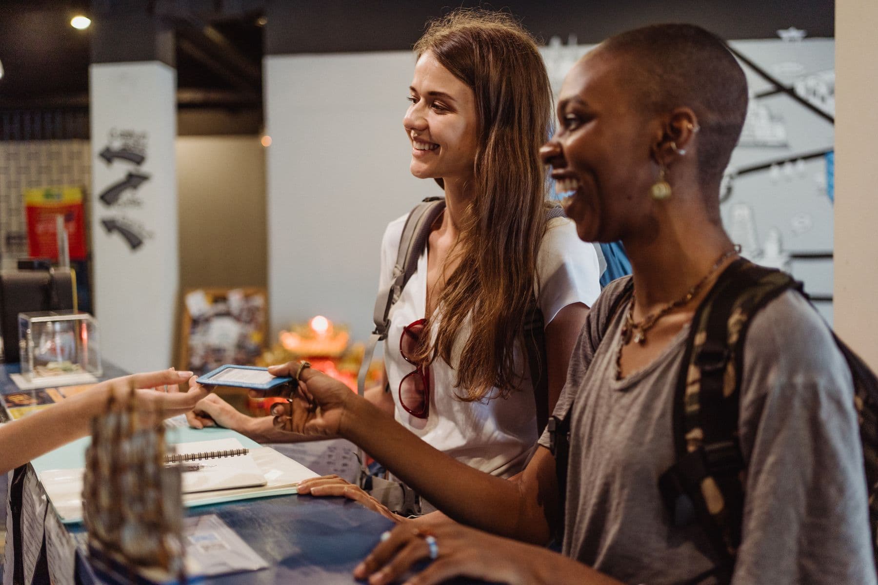 Guests checking in at a reception desk